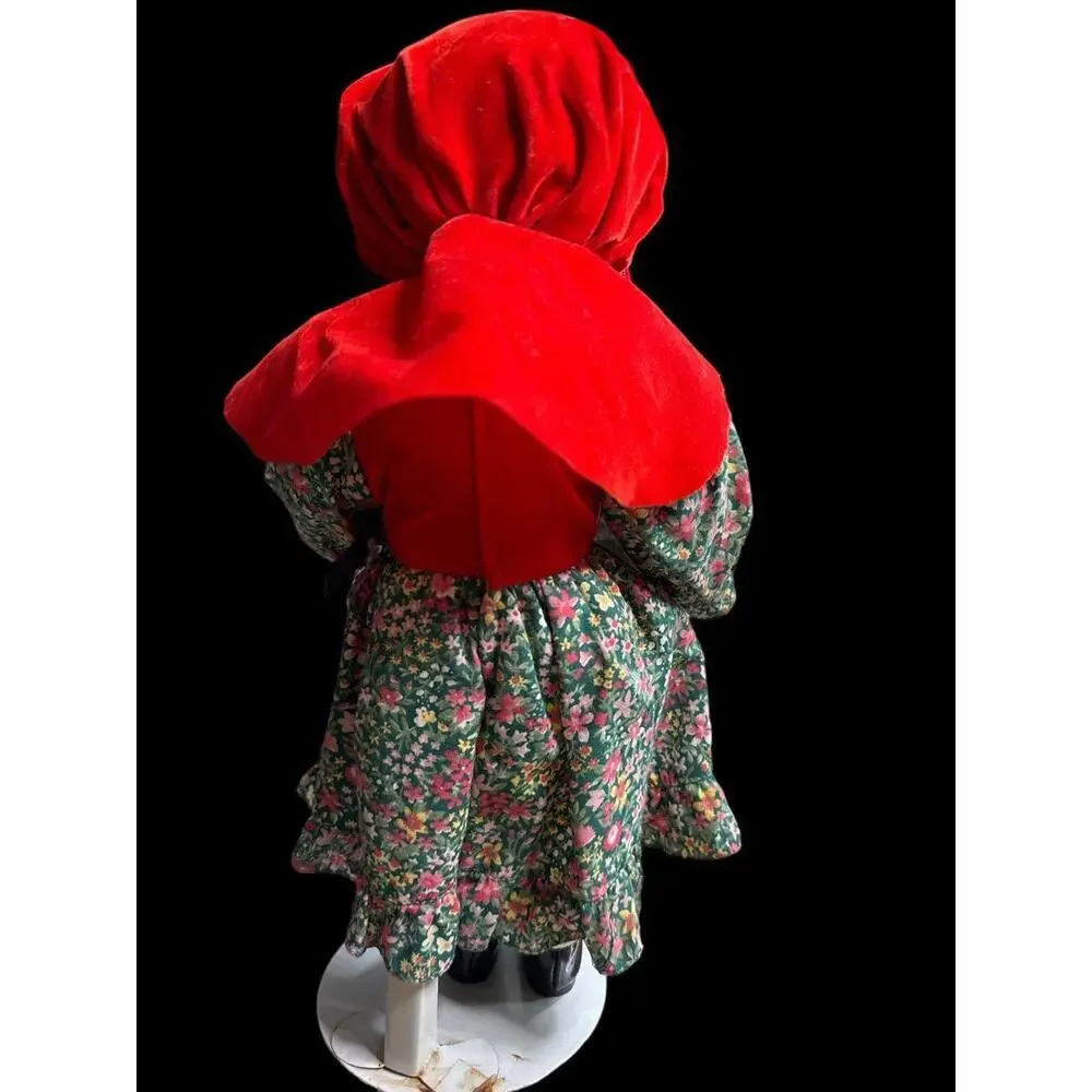 Doll 14”Little Red Riding Hood porcelain display doll in good condition with sta